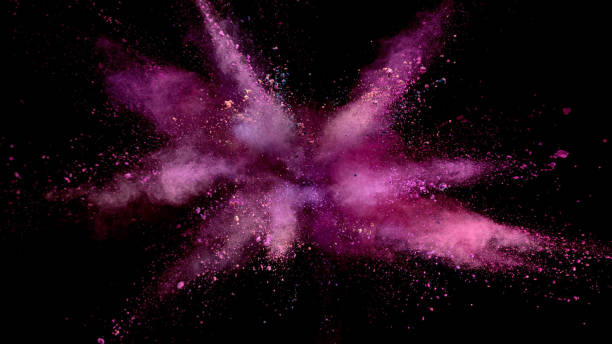 istock Explosion of coloured powder on black background. 1039540566