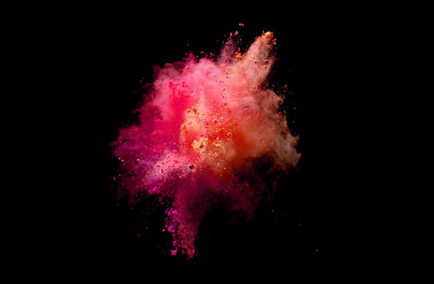 istock Explosion of coloured powder on black background. 1039540662