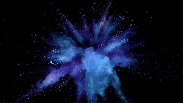 istock Explosion of coloured powder on black background. 1039540878