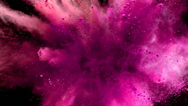 istock Explosion of coloured powder on black background. 1039541948
