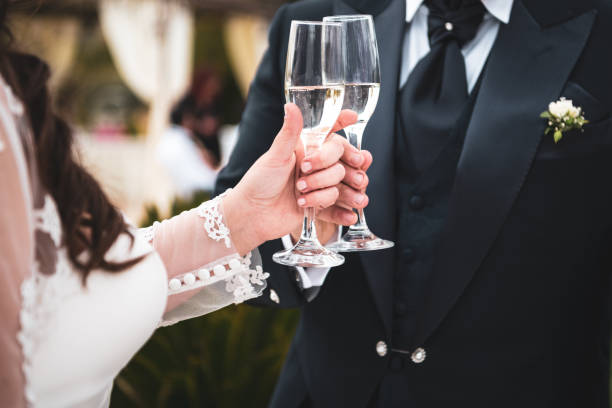 istock a married couple toasts 1039542334