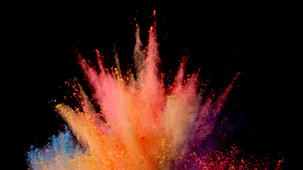 istock Explosion of coloured powder on black background. 1039542832
