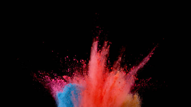 istock Explosion of coloured powder on black background. 1039543004
