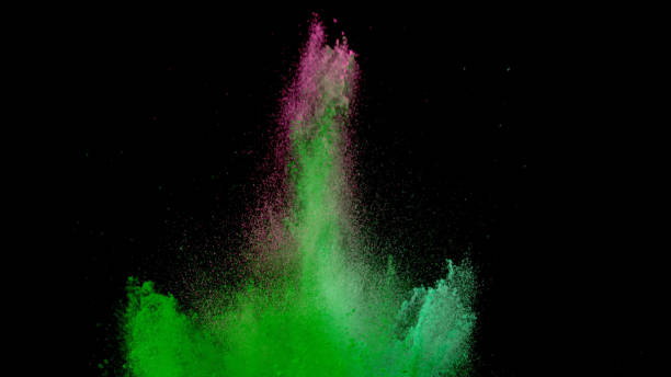 istock Explosion of coloured powder on black background. 1039543082