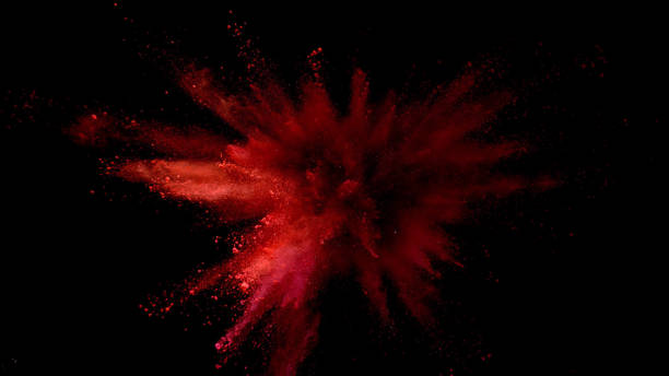 istock Explosion of coloured powder on black background. 1039543352
