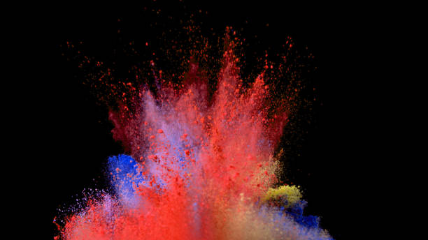istock Explosion of coloured powder on black background. 1039543498