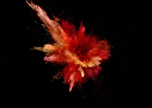 istock Explosion of coloured powder on black background. 1039543504