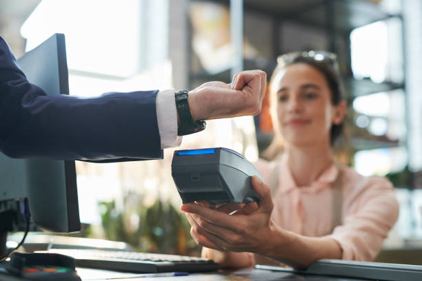 istock Businessman Paying by Smartwatch 1039551488