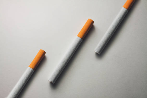 istock Directly Above Shot Of Cigarettes On Table 1039553478