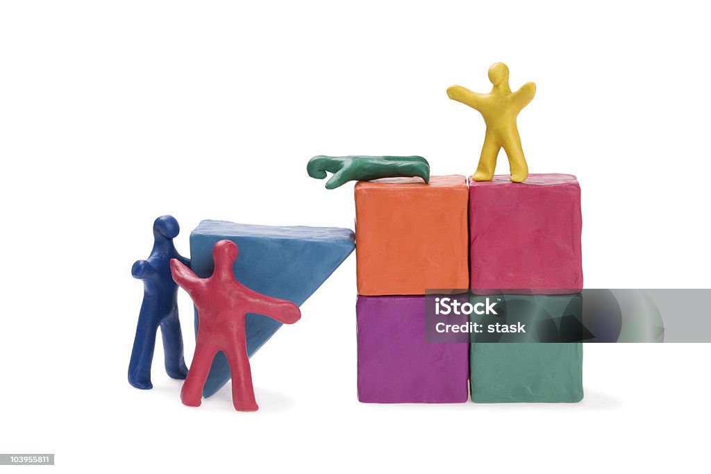 Famiglia sulla costruzione di una casa - Foto stock royalty-free di A forma di blocco