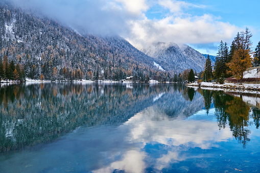 Early winter landscape reflection champex lake, Orsières, Swiss Alps, Switzerland.