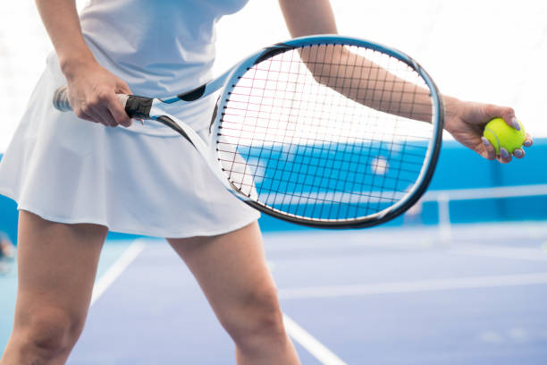 istock Woman Playing Tennis Closeup 1039565678