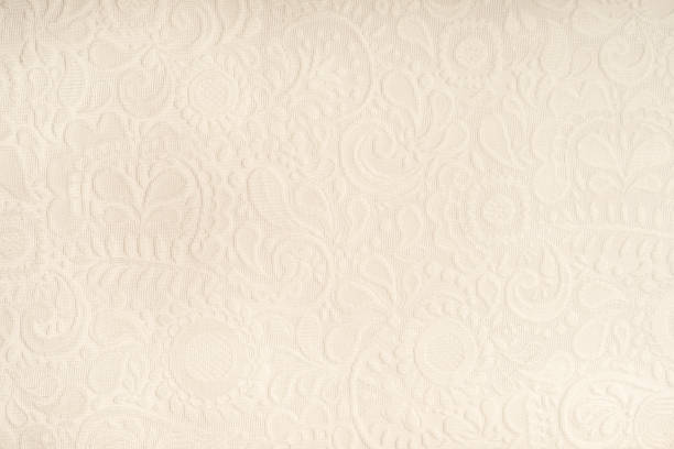 istock Full frame background of Seamless detailed lace pattern on white background 1039566984