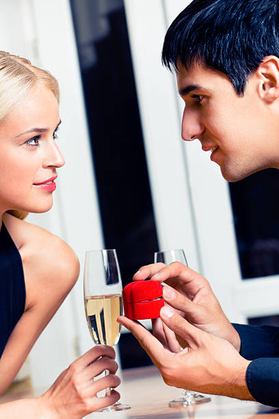 istock Happy amorous couple and a special man proposal in restaurant 103957032