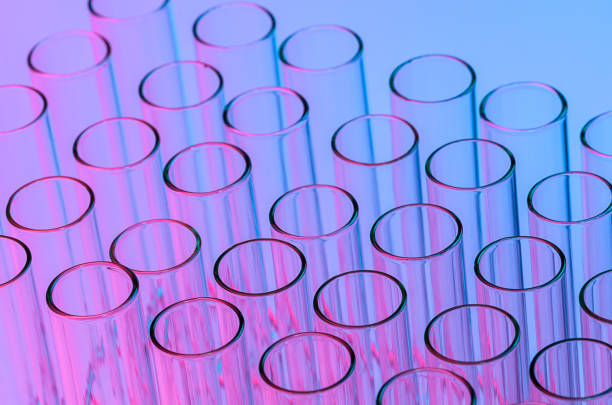 istock Close-Up Of Test Tubes Against Colored Background 1039571638
