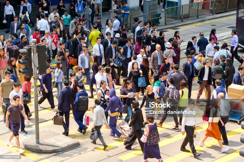 Busy pedestrian crossing at Hong Kong People Stock Photo