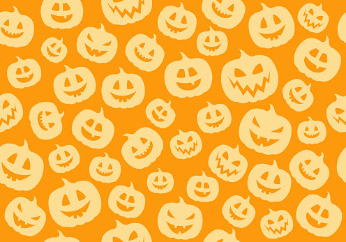 Seamless pattern with funny silhouettes of pumpkins. Vector.