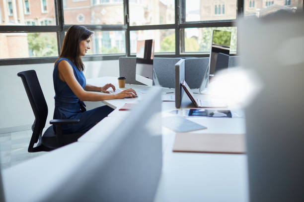 istock Business open office people working, woman typing on computer. 1039576980
