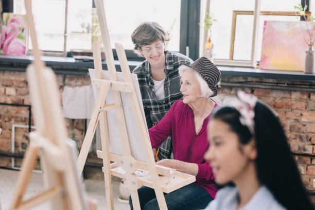 istock Senior Woman in Art Class 1039587166