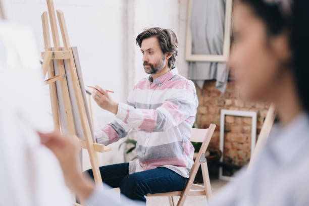 istock Mature Artist Painting in Studio 1039587170
