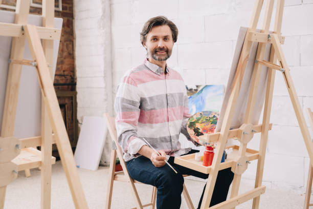 istock Mature Artist Working in Studio 1039587250