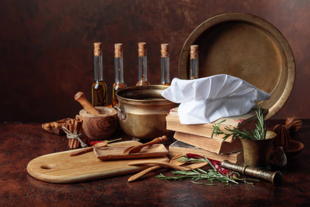 istock White chef's hat and old cookbooks. 1039591680