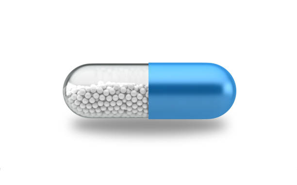 Blue capsule pill isolated on a white background with clipping path stock photo