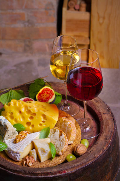 istock Red and white wine in wine cellar 1039600970