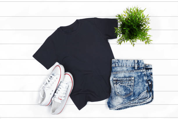 istock Black Feminine T-Shirt Mockup on a White Background 1039604666