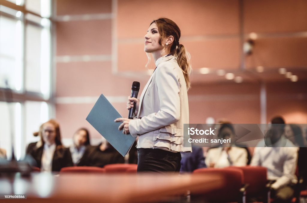 Business People Listening to the Speaker at a Conference Public Speaker Stock Photo