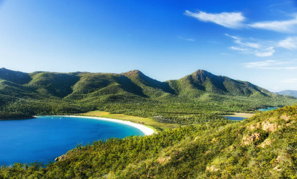 Wineglass bay Wineglass Bay on the Freycinet Peninsula in North East Tasmania on a clear sunny day. inlet photos stock pictures, royalty-free photos & images