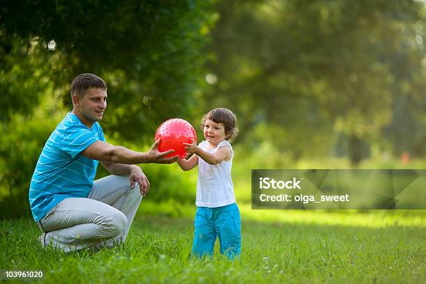 Playing Ball Stock Photo - Download Image Now - Adult, Cheerful, Child