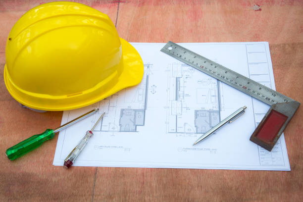 istock engineering and construction accessories, Safety Helmet, screwdriver, Screwdrivers Mains Tester, construction plan and Machinist square. 1039610558