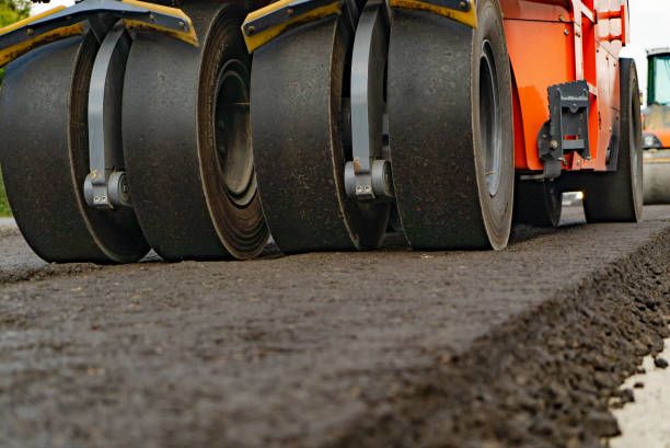 istock large roller wheels are made for sealing and leveling the ground, road surfaces. 1039611278