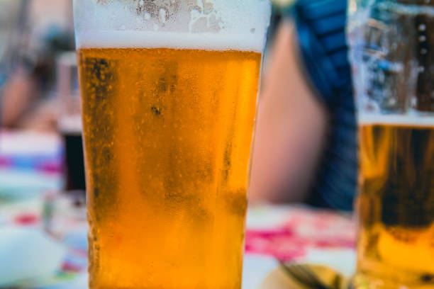 istock Closeup on a beer glasses at a restaurant 1039612446