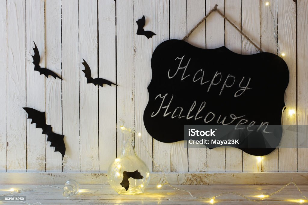 Halloween decorations on wooden background in home Halloween Stock Photo