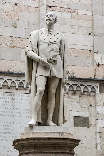 Statue of Italian poet Alessandro Tassoni in Modena, Italy made by Alessandro Cavazza at 1860