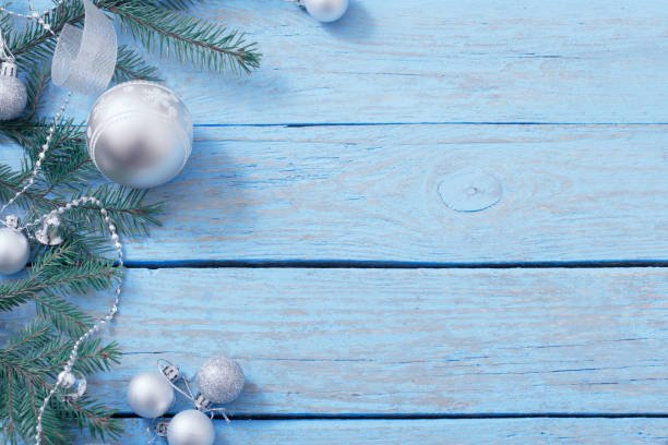 istock Christmas decoration on blue wooden background 1039623654