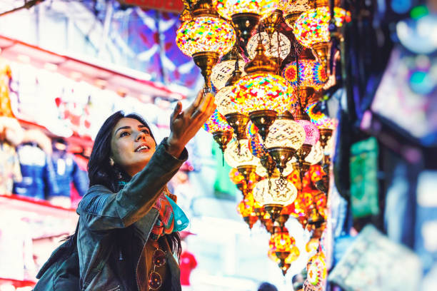 Beautiful young woman shopping in Grand Bazaar, Istanbul, Turkey stock photo