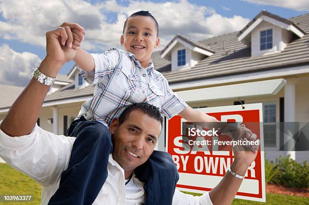 Hispanic Father And Son With For Sale By Owner Sign Stock Photo - Download Image Now