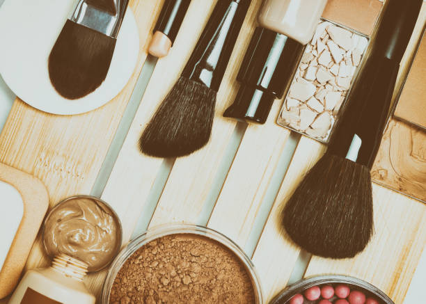 istock Face make-up products with professional makeup brushes, retro style 1039637088