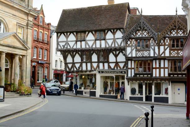 Ludlow town centre Ludlow, United Kingdom - September 17, 2017 - Ludlow town centre, showing old historic buildings and architecture, multiple people can be seen, Ludlow, Shropshire, UK ludlow shropshire stock pictures, royalty-free photos & images