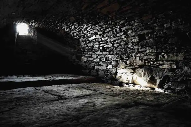 Spooky underground, old historical stony cellar