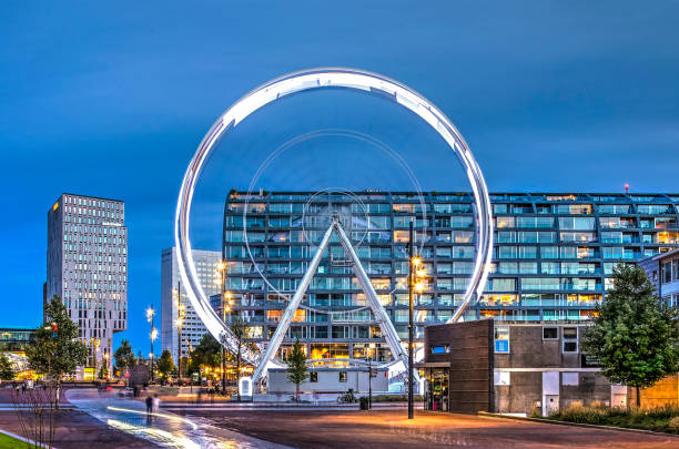 Rotterdam, The Netherlands, September 15, 2018: Binnenrotte square during the blue hour with the temporary Ferris wheel and the Markthal