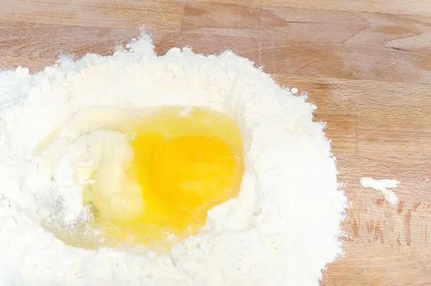 Photo of homemade cake, mixing fluor and eggs