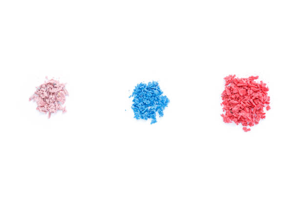 istock pile blue, pink, red crayons on white background. 1039648016