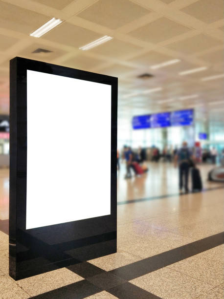 istock Empty billboard frame with clipping path at the defocused airport background 1039670032