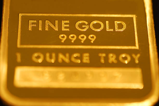 Fine gold bar one ounce Troy 9999 stock photo