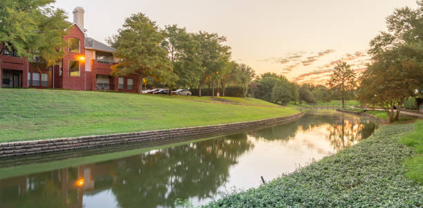 istock Panoramic waterfront apartment complex in suburban Dallas Fort Worth, Texas at sunset 1039671224