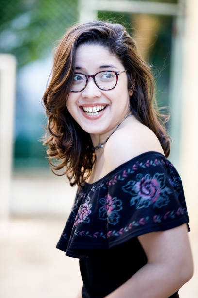 istock Surprised young woman with eyeglasses looking at something 1039682656